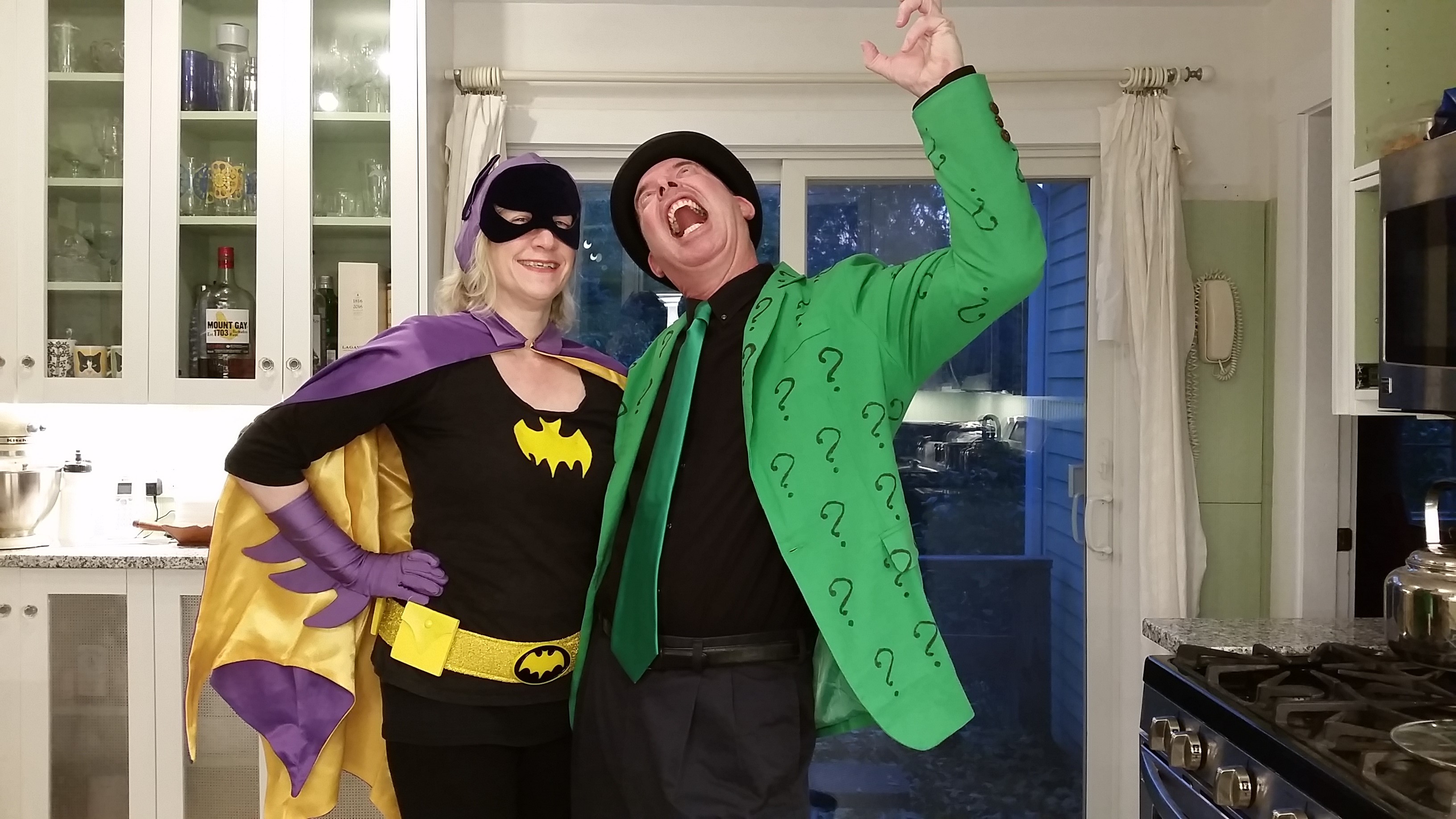 Abby Kingsbury dressed as Batgirl and her husband dressed as The Riddler